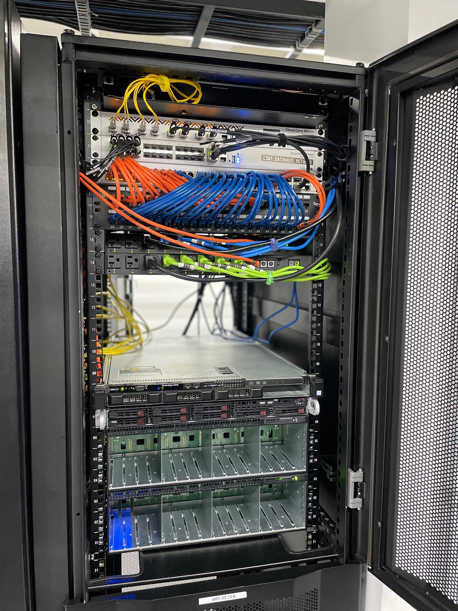 Sentinel South structured cabling showpiece — color-coded rack